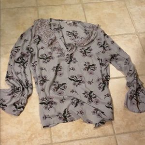 Ruffled blouse with sexy V-neck